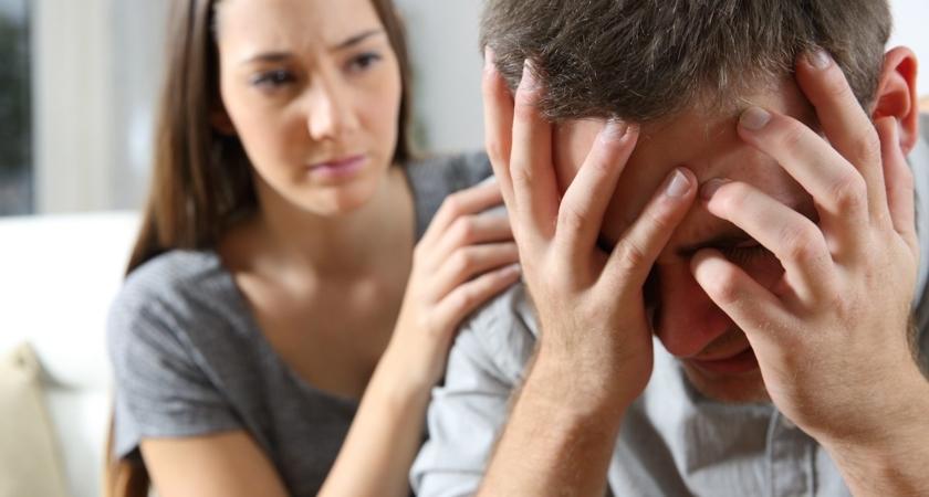Couple with man in panic attack