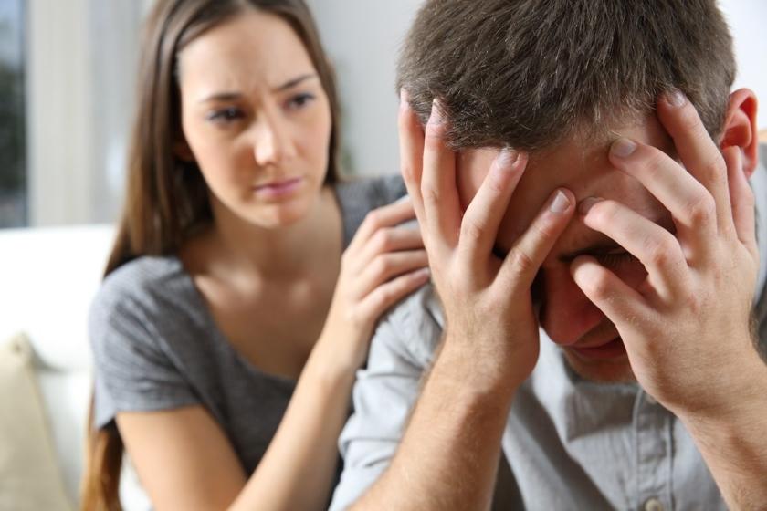 Couple with man in panic attack